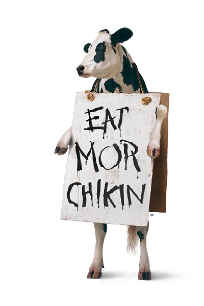 Chick-fil-A Cow with Eat Mor Chikin sign